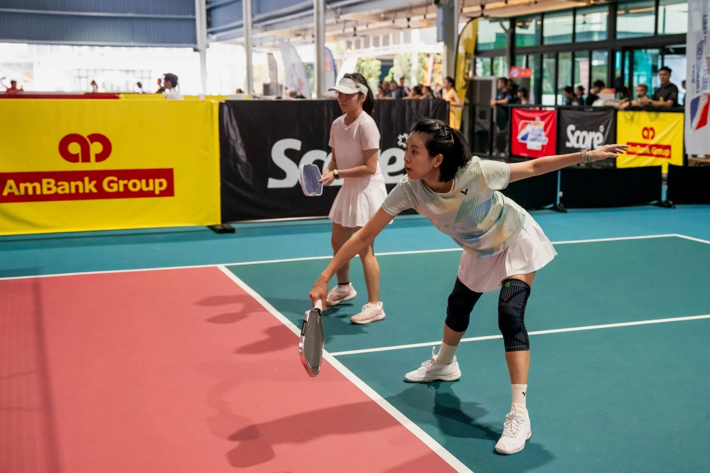 Goh Liu Ying (foreground) and Ooi Kah Yan (front). Image courtesy of Score via NST.com.my