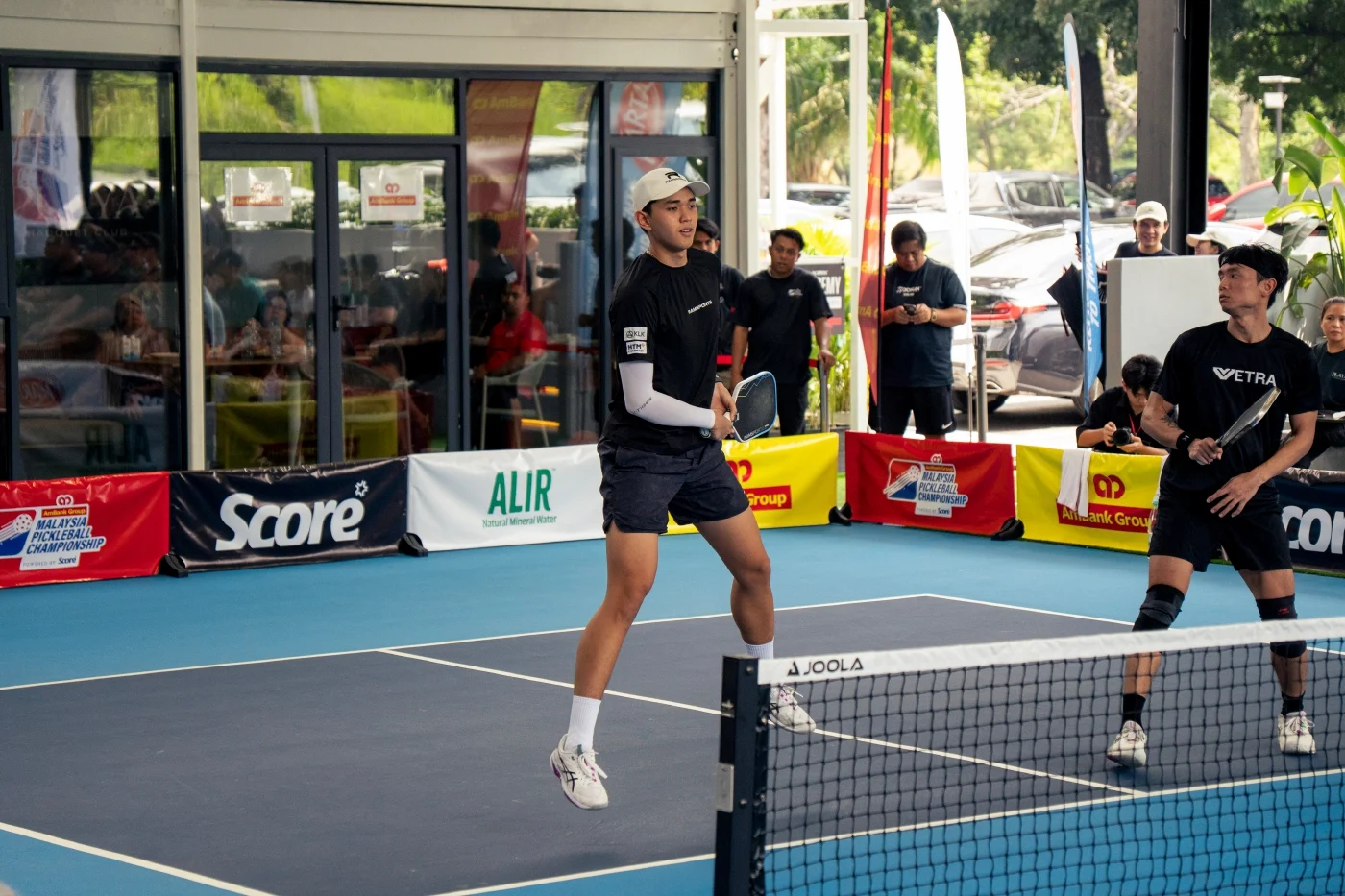 Khoo Er Yang (right) and Farreez Isqandar. Image courtesy of Score via NST.com.my