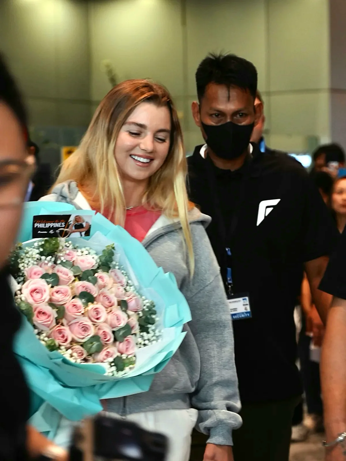 Anna Leigh Waters at NAIA arrivals with the Franklin team