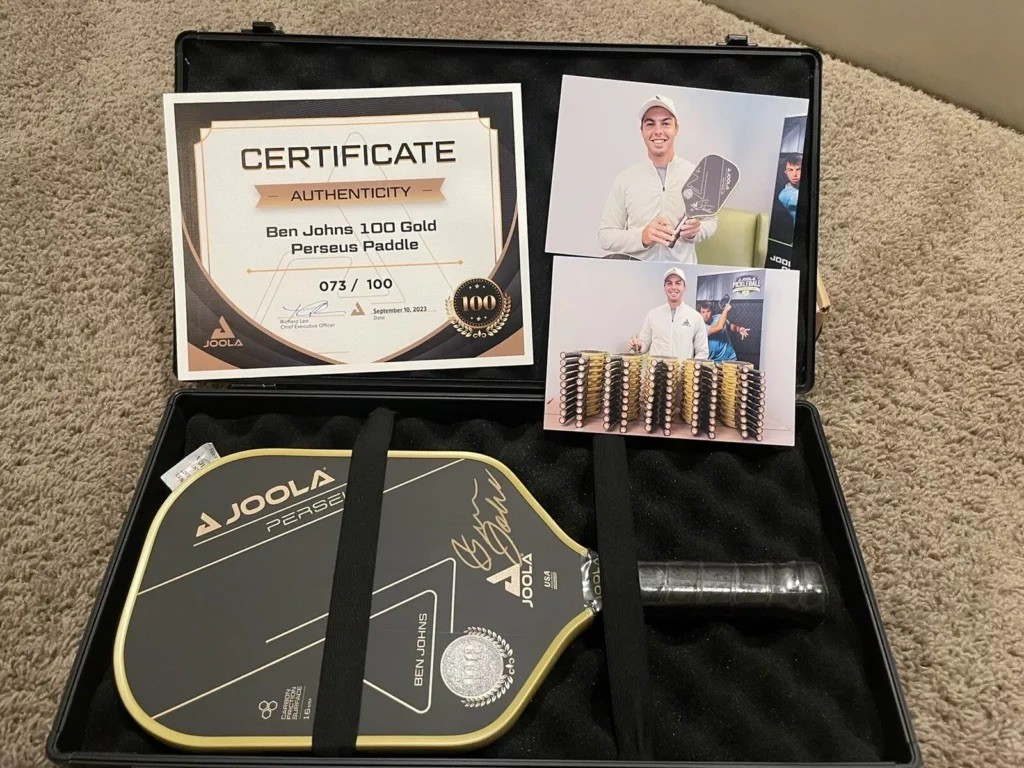 JOOLA Ben Johns Perseus 100 Gold Collector Signed Pickleball Paddle currently priced at USD 3,6000. Image courtesy of eBay