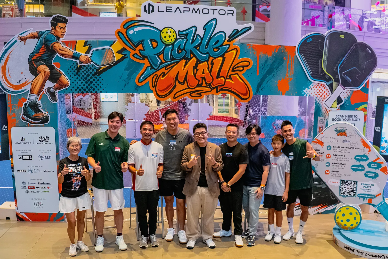 From left: Elaine Yong, Isaac Yeo (Leapmotor), A/Prof Elmie Nekmat (Grassroots Adviser for
Sengkang Central), Jason Lim (Stratgeist Sports), Hai Nguyen (Reclub), Thomas Nguyen
(JOOLA), Corinna Lim (Centre Manager, Sengkang Grand Mall), Isaac Toh, Adrian Ang (Xiao Ming). Photography by Gene Kam (@kgene)
