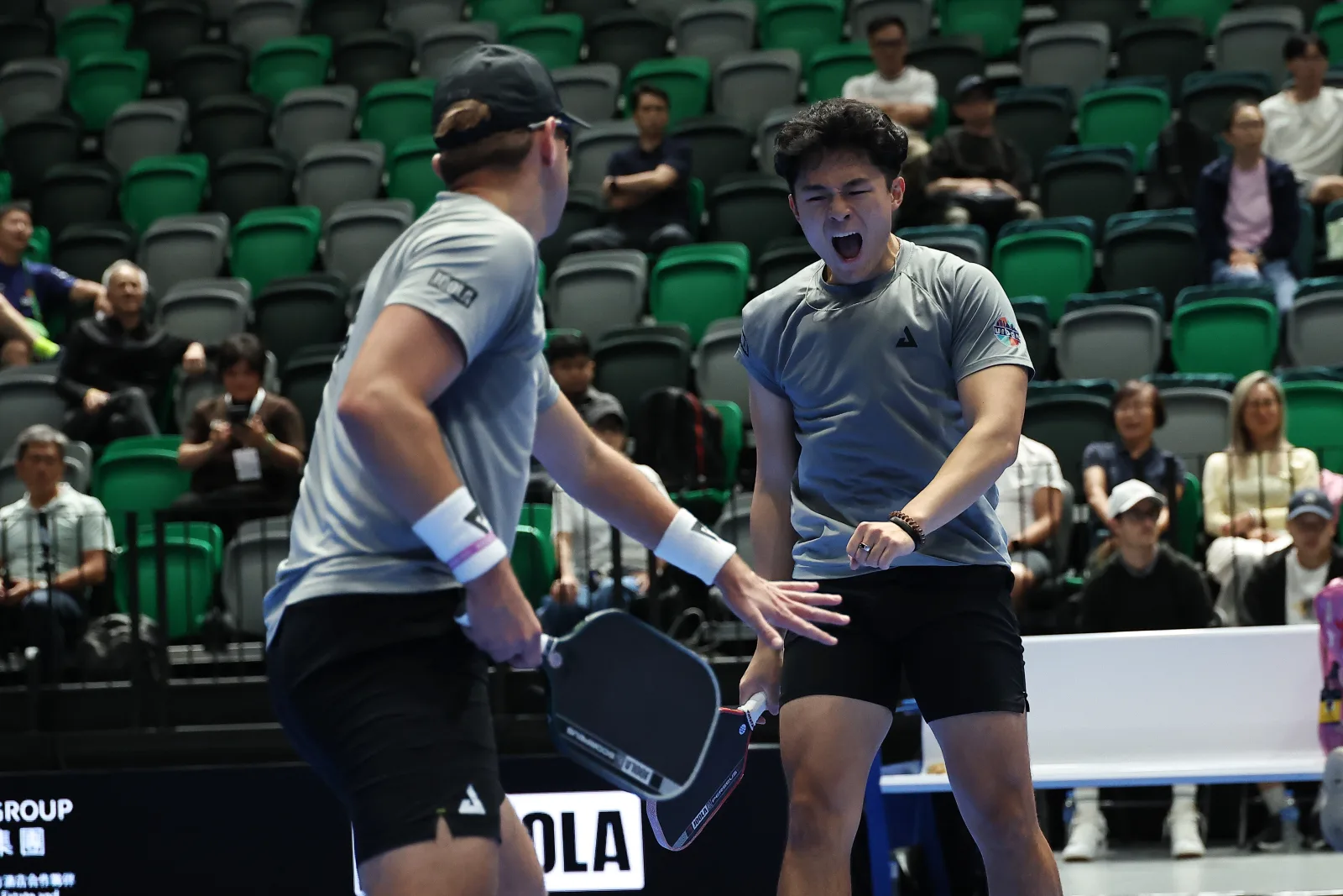 Collin Johns and Len Yang during their round-of-16 win over Eunggwon Kim and Hong Kit Wong on Thursday.