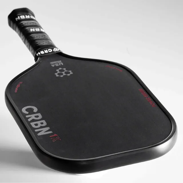 CRBN-1X Power Series Pickleball Paddle featuring a sleek dark grey and black design. Medium sized grip with circumference measuring 4.25 inches
