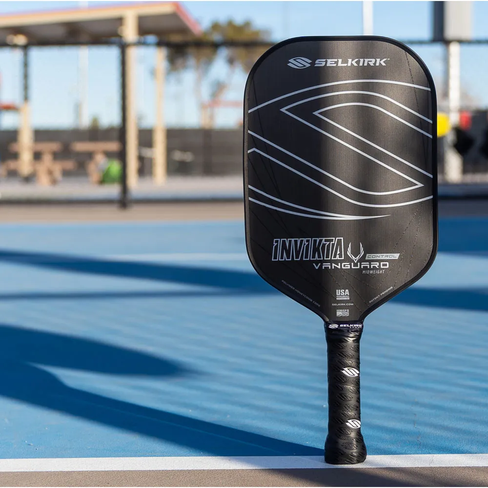 Selkirk Vanguard Control Invikta Pickleball Paddle on a pickleball court